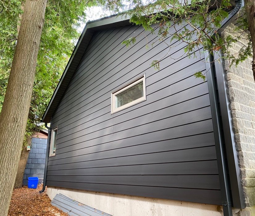 port elgin home with vinyl siding and new gutters