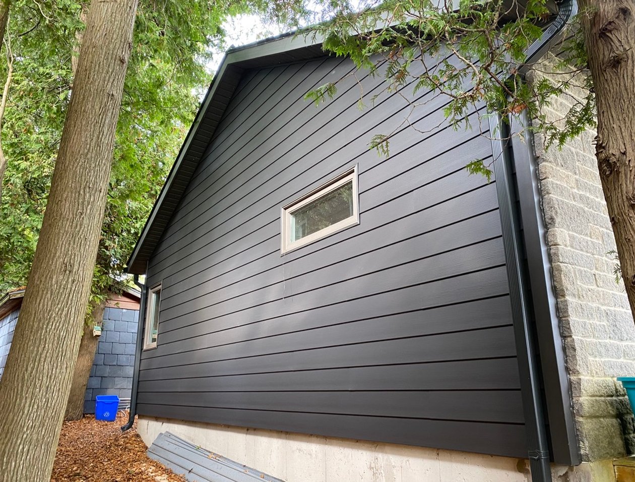 port elgin home with vinyl siding and new gutters